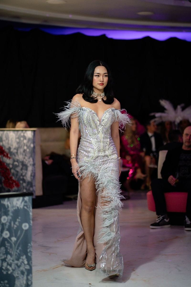 Model in a silver gown on the ramp