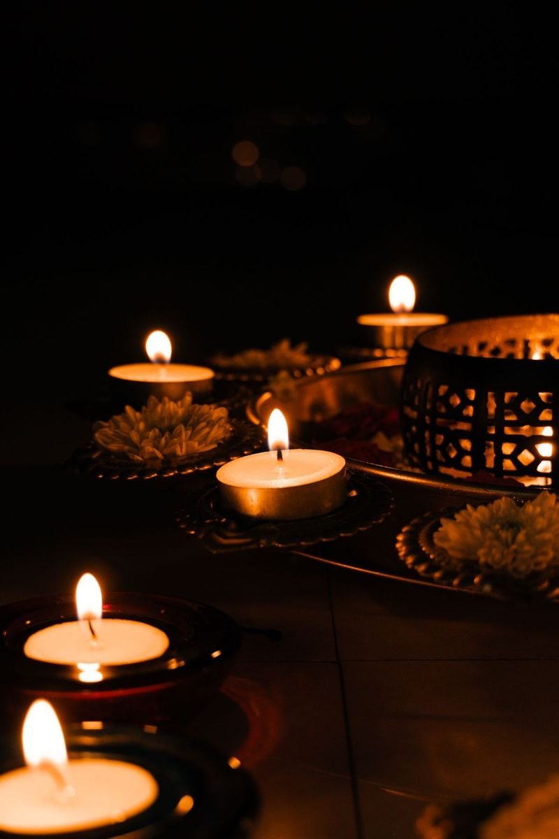 Tea lights glowing in the dark