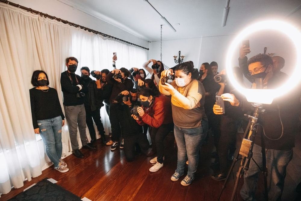 Photographers and media at a press event