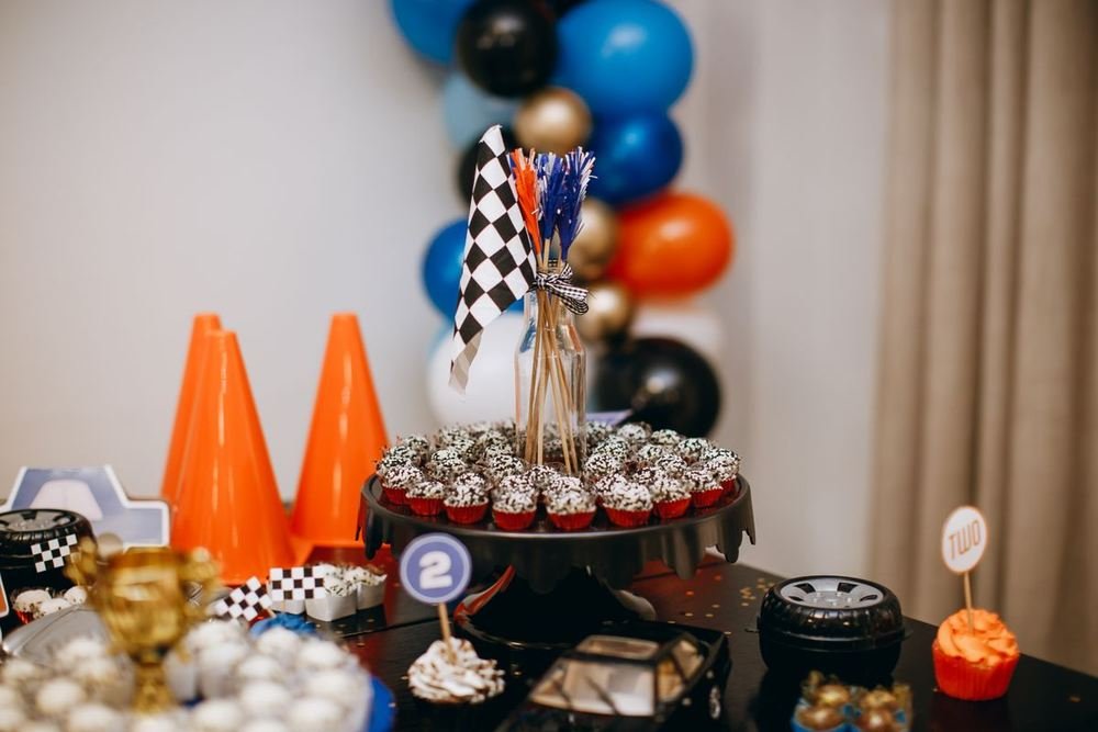 Birthday dessert table with balloons