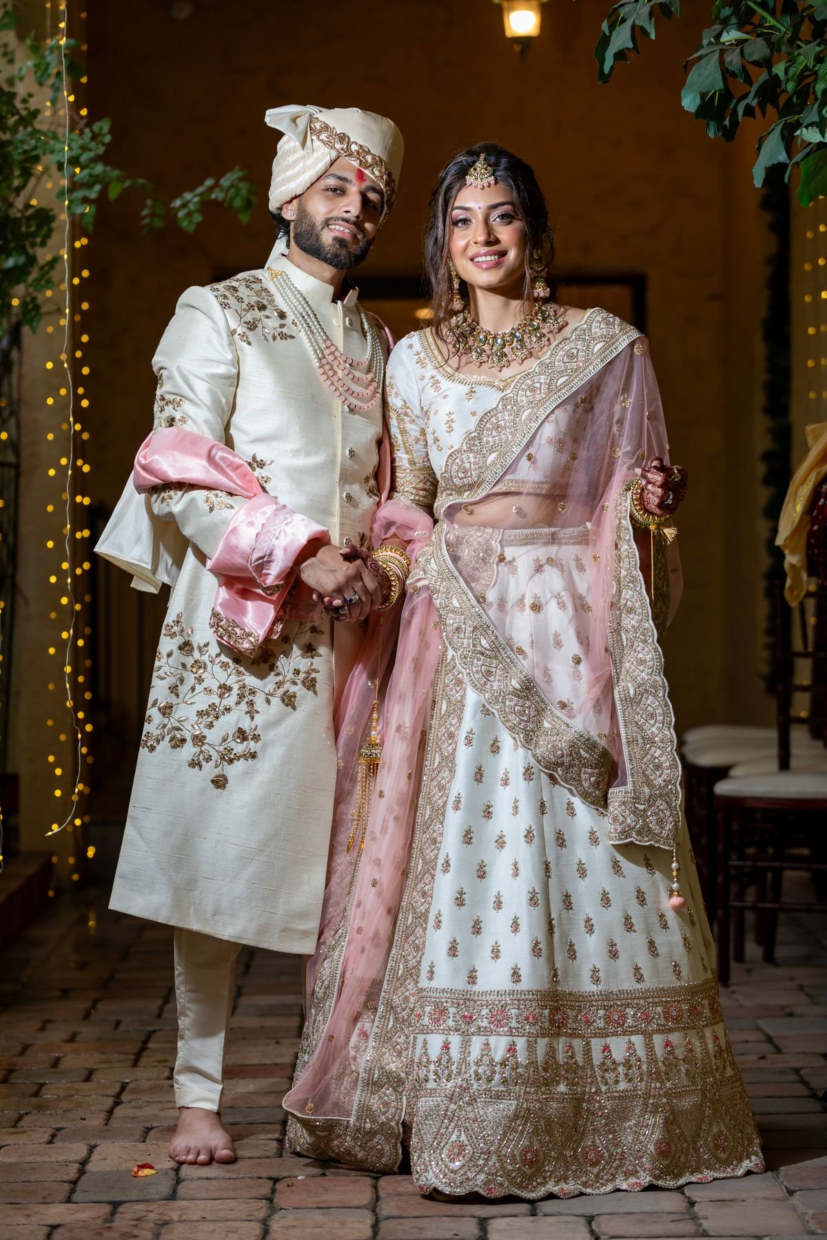 Bride and groom in traditional wedding outfits